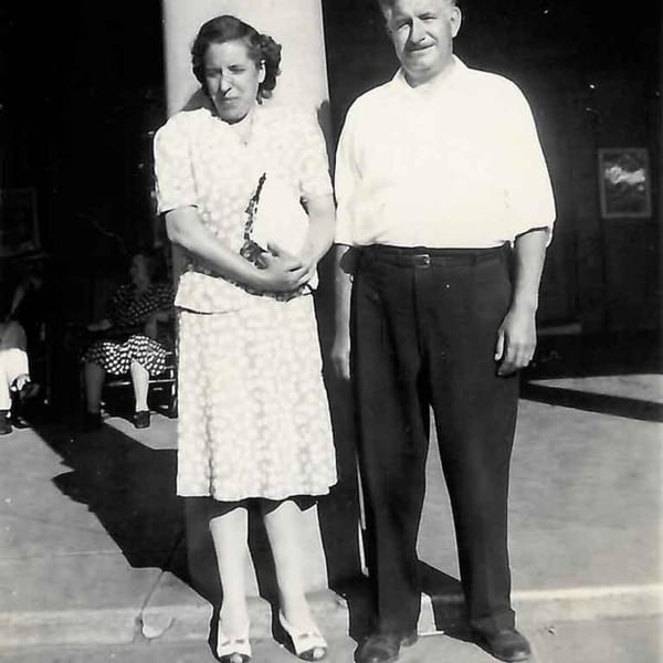 Black and white photo of a man and woman standing together, possibly the founders of Marrelli's.